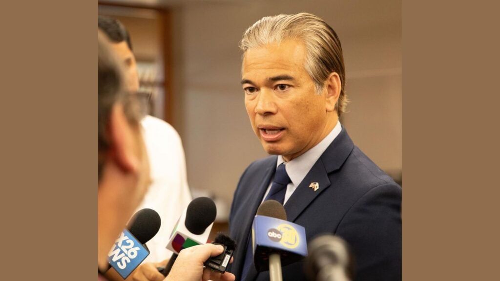 California Attorney General Rob Bonta speaks with reporters. Bonta recently issued a legal opinion declaring daily fantasy sports (DFS) illegal.