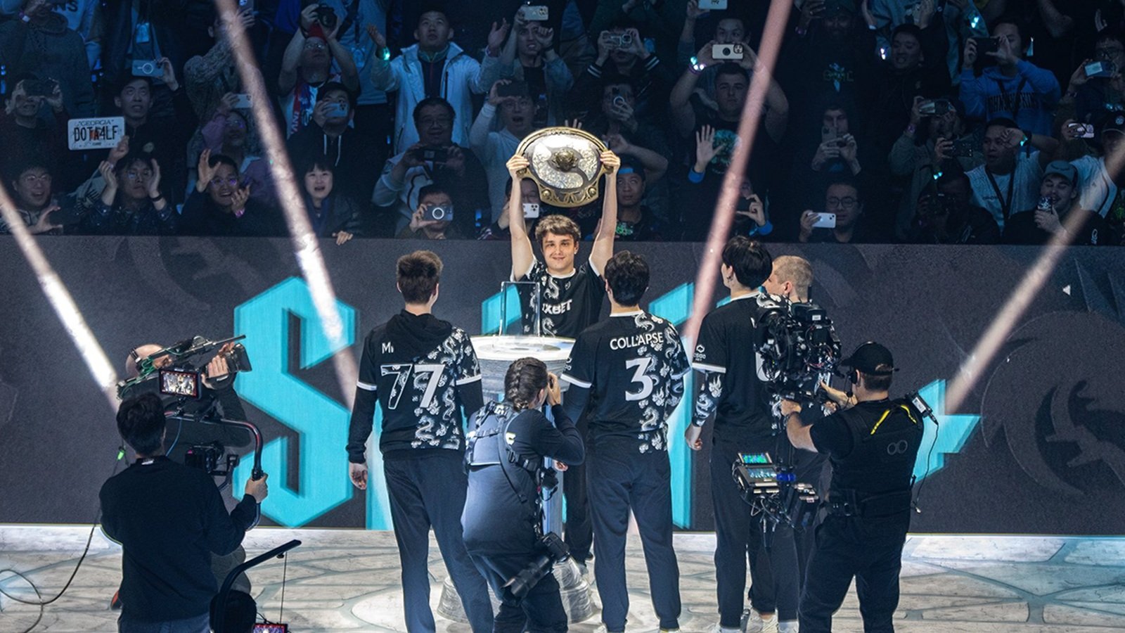 Photograph showing Team Spirit with the Aegis after TI12.