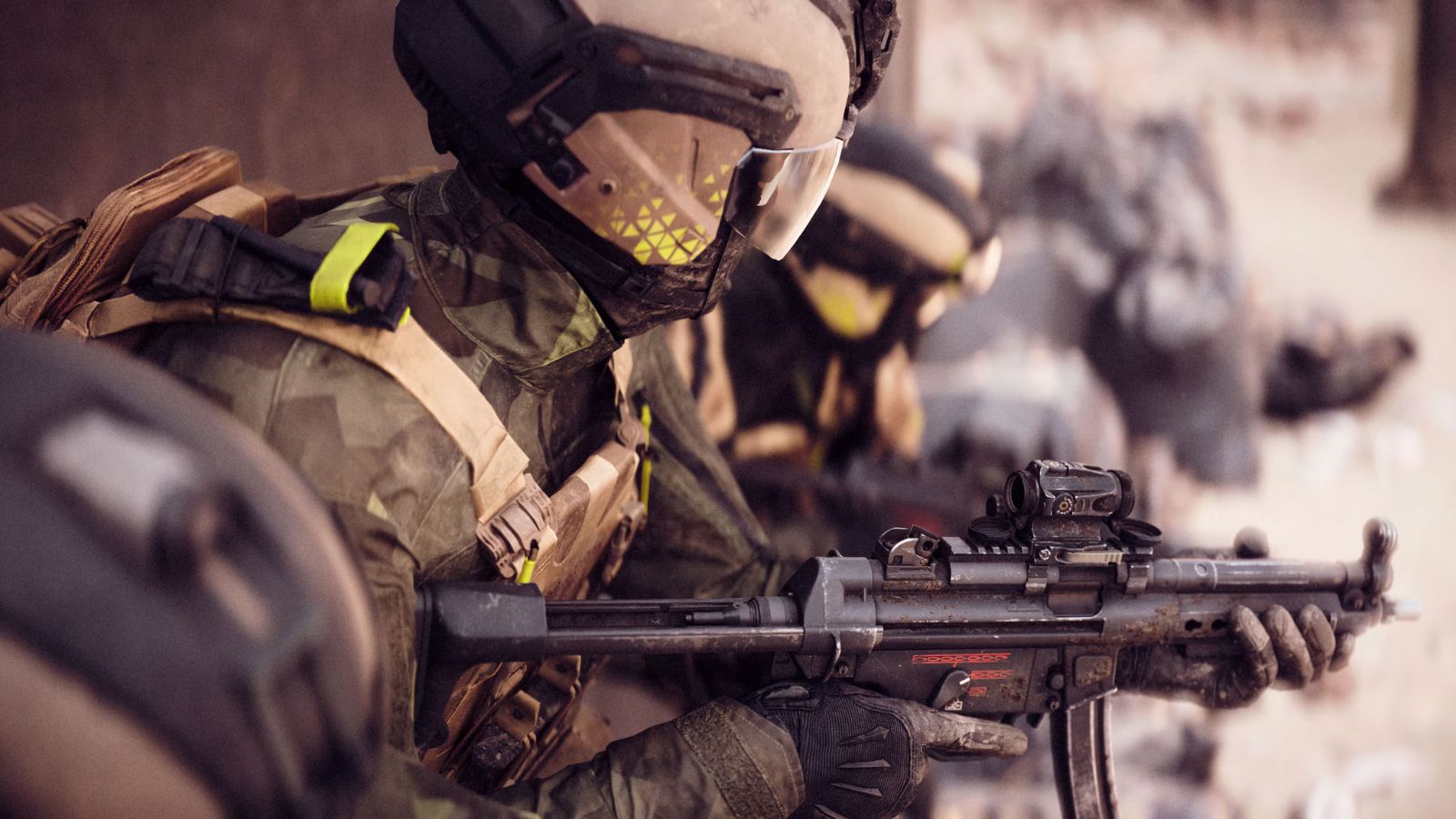 A soldier holding an SMG in key image for Battlefield 6 classes.