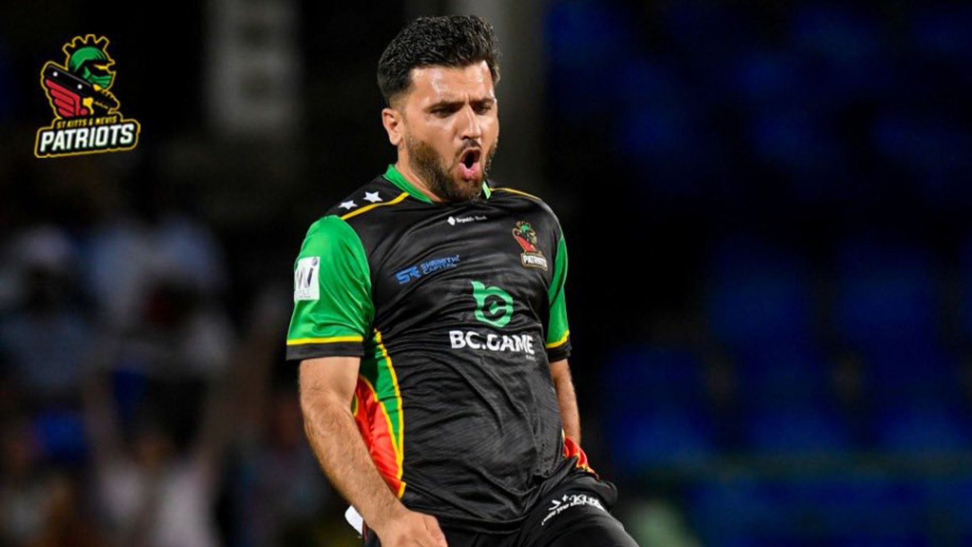 St. Kitts & Nevis Patriots, wearing a jersey showing BC.Game as sponsor, screams during a game.