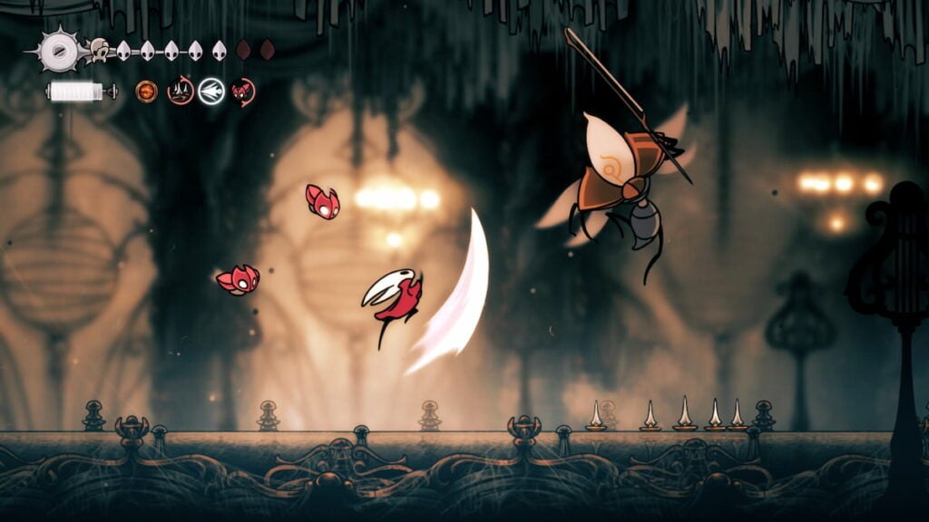 Picture showing player fighting enemies in Hollow Knight Silksong.