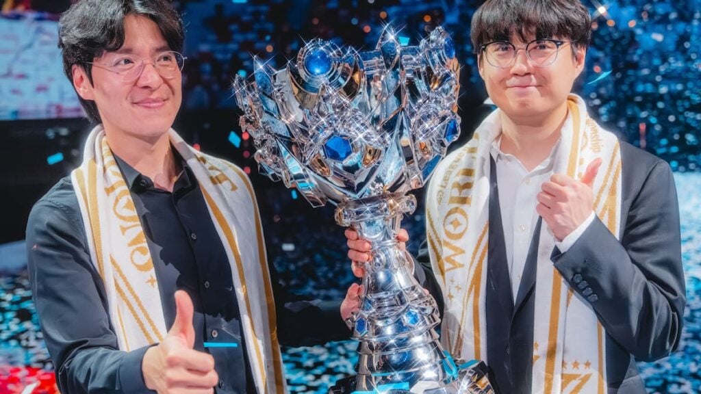 Coach kkOma (left) and Mata of T1 celebrate onstage after being crowned champions at League of Legends Worlds 2025 Finals on November 08, 2025 in Chengdu, China.