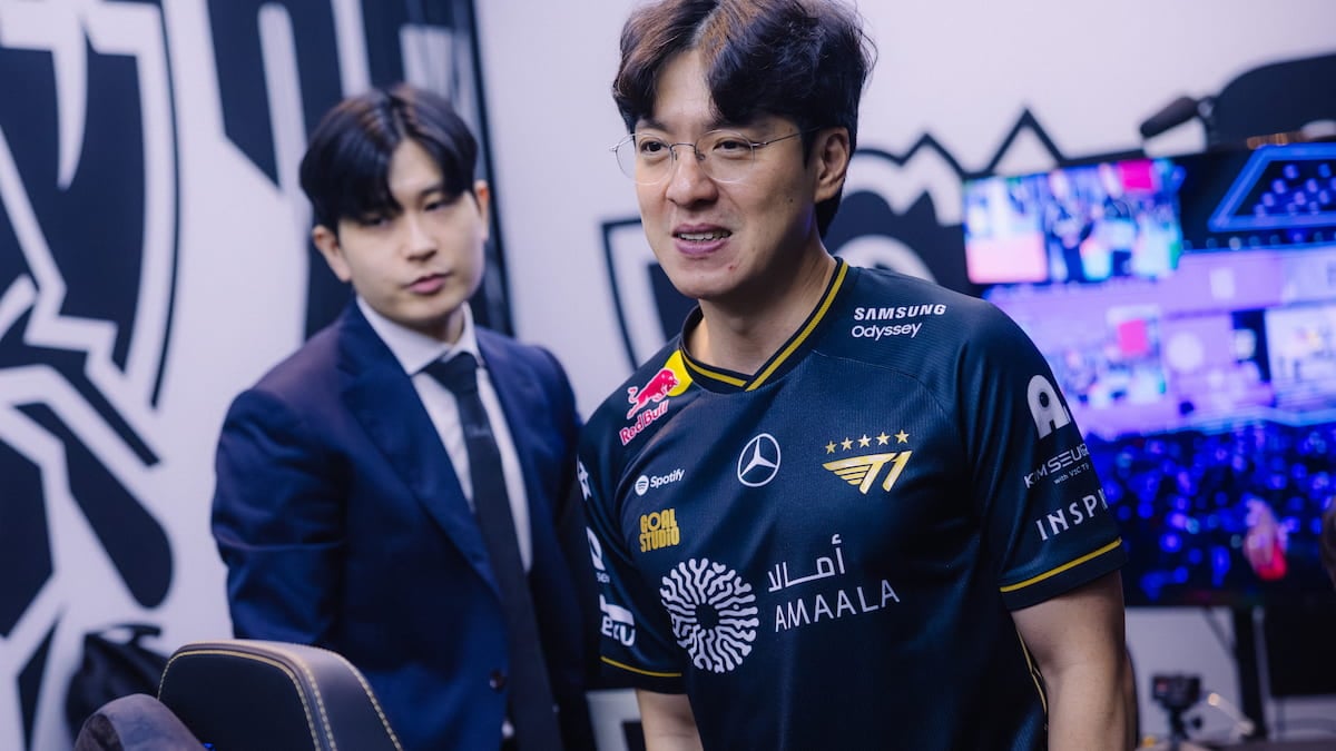 Coach Tom (L) and coach kkOma of T1 compete at League of Legends Worlds 2025 Play-In Stage on October 14, 2025 in Beijing, China.