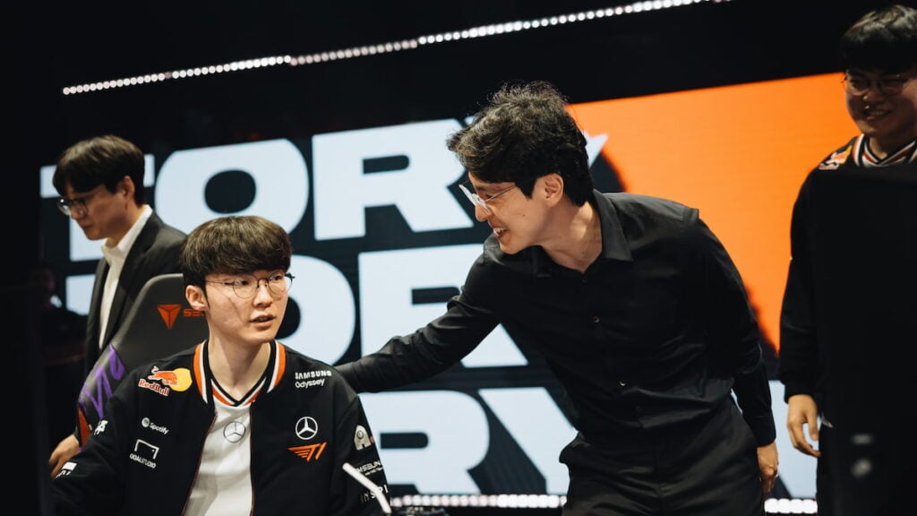 Faker (L) and coach kkOma of T1 after victory at MSI 2025 Bracket Stage Day 10 at the Pacific Coliseum in Vancouver, Canada on July 11, 2025.