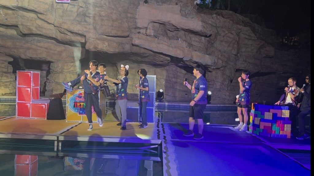 Coldless being thrown into the pool following his victory