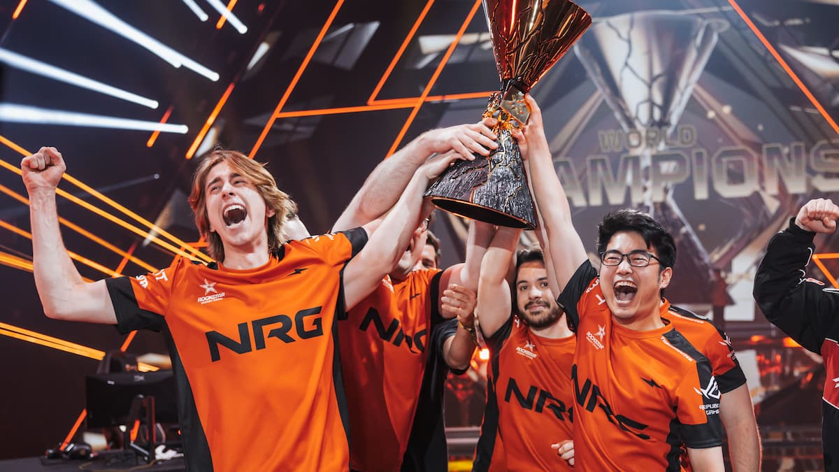 PARIS, FRANCE - (L-R) mada, Ethan, and s0m of NRG raise the trophy after winning the VALORANT Champions Paris Grand Finals at Accor Arena on October 5, 2025 in Paris, France