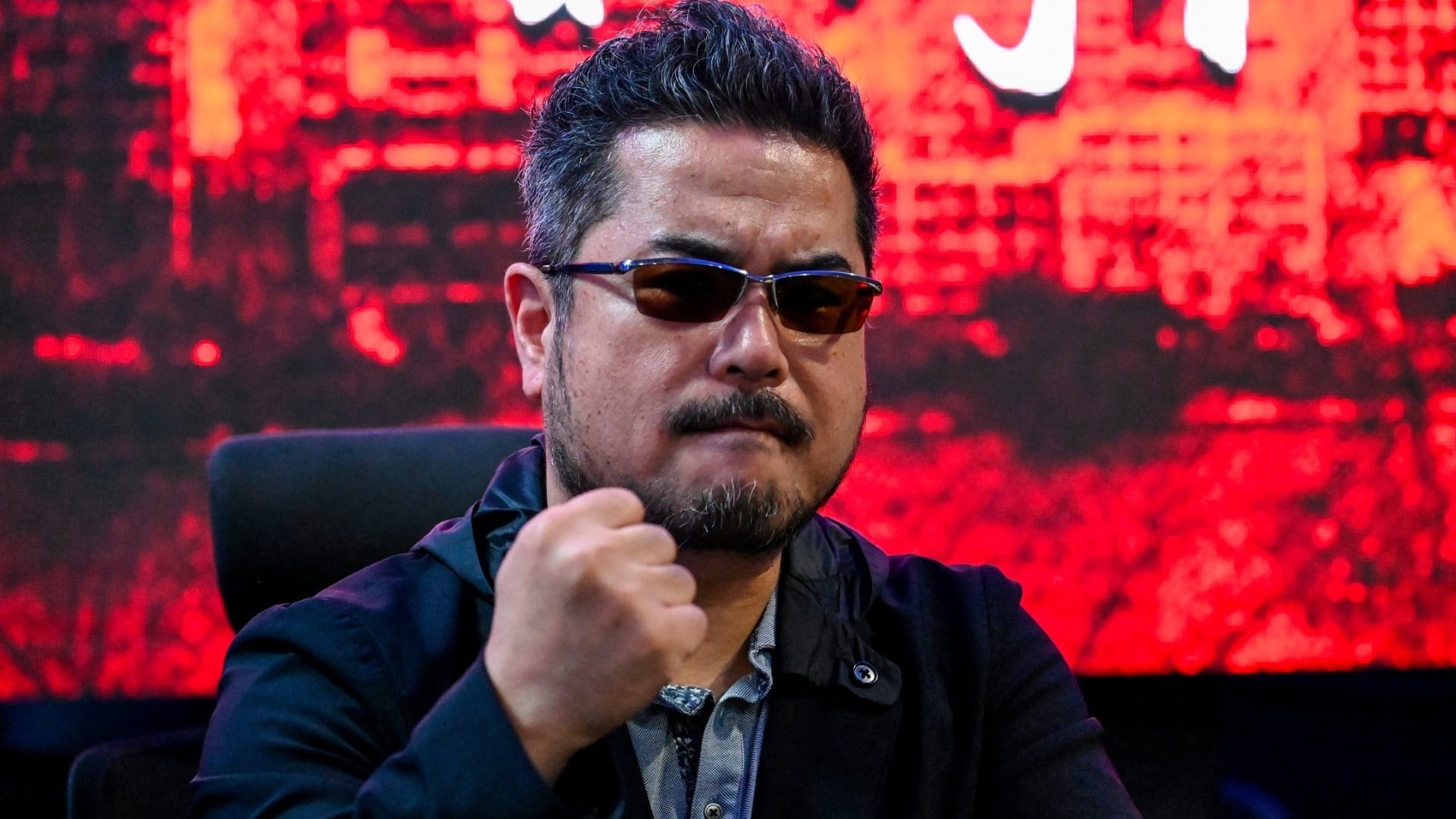Harada showing fist