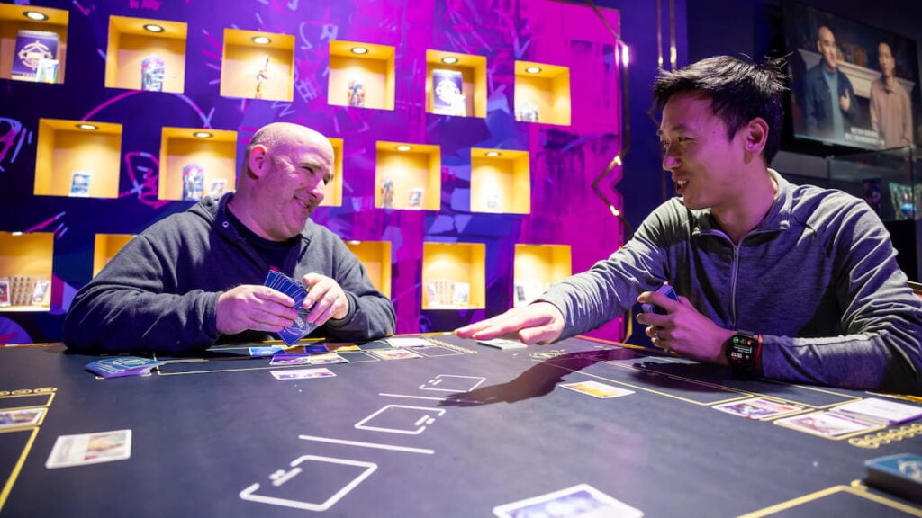 Picture showing Riftbound Director Dave Guskin and Executive Producer Chengran Chai playing Riftbound.